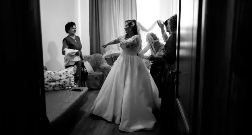 A bride prepares for her wedding indoors wit - Weddings (General)