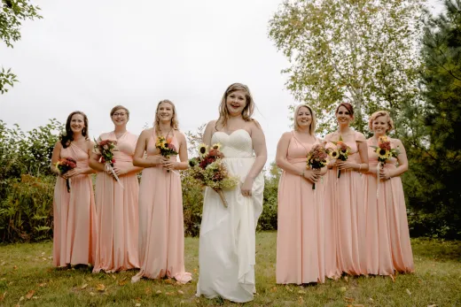 A joyful bride with her bridesmaids in a lus - Weddings (General)