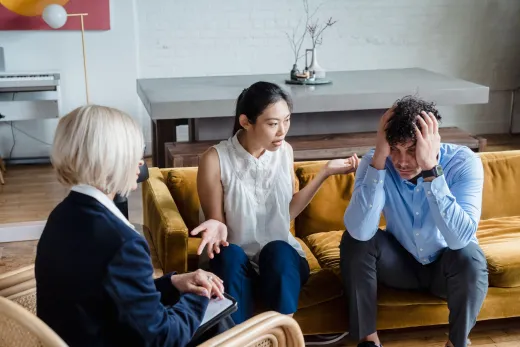 A couple having a therapy session with a psy - Marriage & Relationships