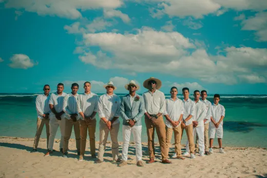 A group of groomsmen with the groom on a bea - Weddings (General)