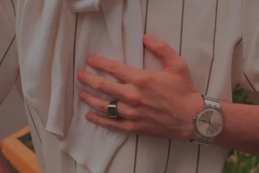 Close up of a hand wearing a wristwatch and - Wedding Fashion & Jewellery
