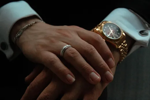 Close up of a person s hands adorned with a - Wedding Fashion & Jewellery