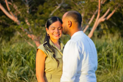 A couple sharing a tender moment outdoors in - Marriage & Relationships