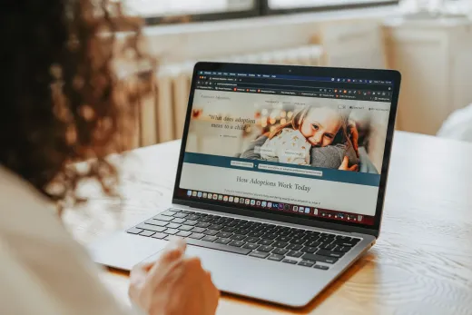 A woman researching adoption information on - Marriage & Relationships