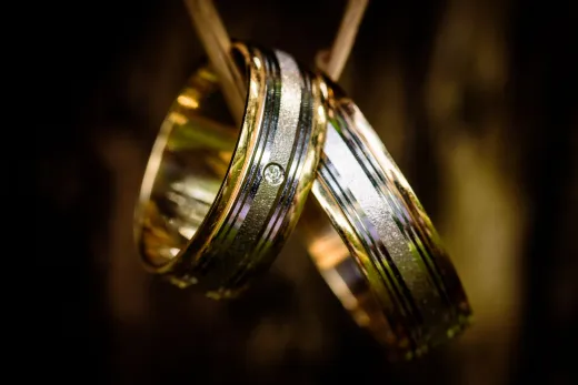 Close up of luxurious gold wedding rings wit - Wedding Fashion & Jewellery