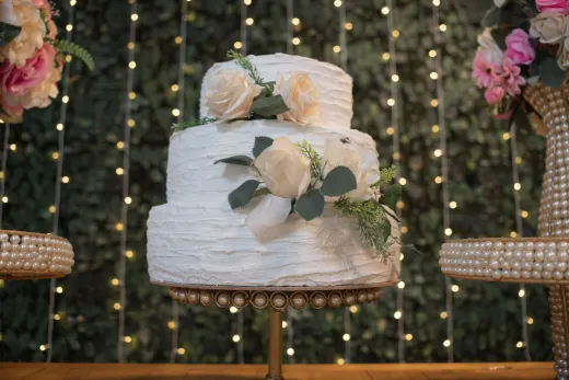 Beautiful two tier wedding cake adorned with - Weddings (General)