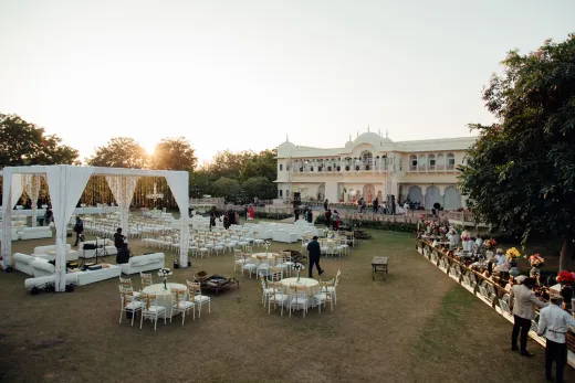 A luxurious outdoor wedding setup at a grand - Wedding Planning & Budget